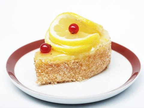 Cake decorated with lemon Stock Photos