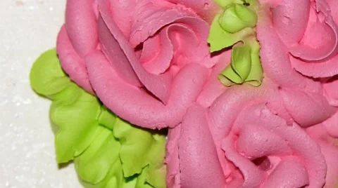 Cake decorating. Big beautiful cake with roses closeup. Video stock 62982266