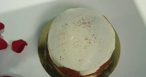 Cake Decorating with Rose petals Stock Footage 89871569