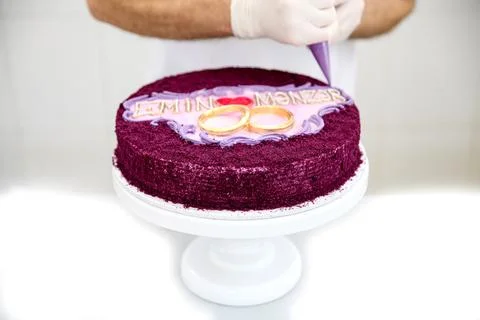 Cake decoration process at a bakery with a focus on design Stock Photos