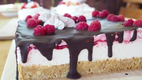 Cake decoration by squeezing cream out of the bag. chocolate cake with cream Stock Footage 144045430