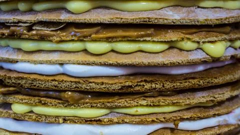 Cake with different types of cream, close-up Foto stock