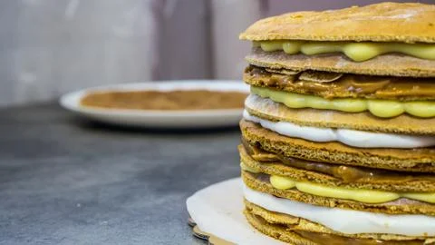 Cake with different types of delicious cream, half cake Stock Photos