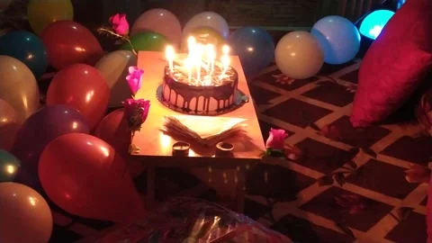 A cake is display with candles blowing. Stock Footage 145516979