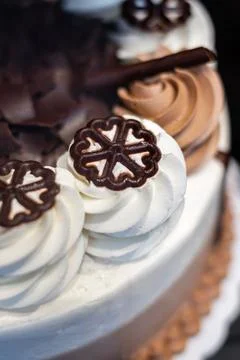 Cake displayed in shop window. Cake with whipped cream. Vanilla cream on to.. Stock Photos