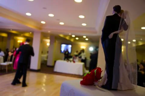 Cake dolls observing Stock Photos