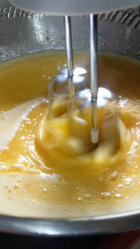 Cake dough made from flour, butter, eggs all mixed together Stock Footage 306471765