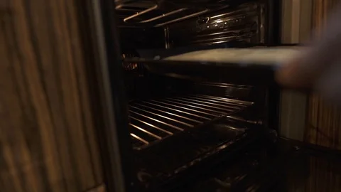 Cake dough in the oven Stock Footage 127102981