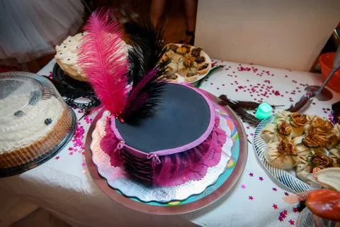 Cake with feathers in the form of a hat Stock Photos