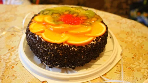 Cake filled with fruit cut into pieces Stock-Footage 49942639