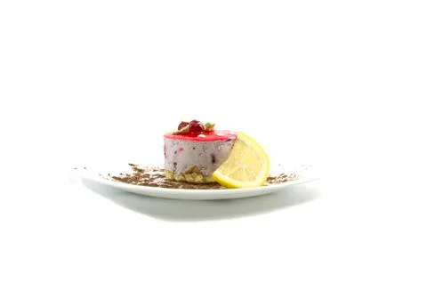 Cake in the form of a mushroom, with a lemon segment Stock Photos