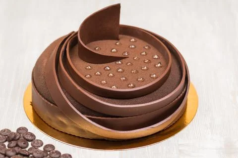 The cake with frosting dots on the table Stock Photos