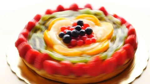 Cake of fruit presentation rotating on round board Stock Footage 81362993