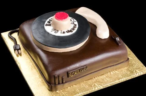 Cake on isolated black background Stock Photos