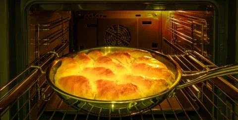 Cake with jam in the oven Stock Photos
