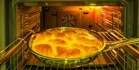 Cake with jam in the oven Stock Photos