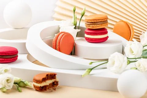 Cake macaron or macaroon on green background Stock Photos