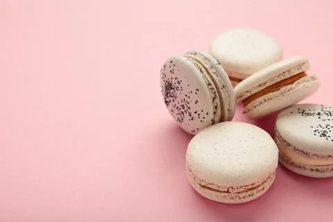Cake macaron or macaroon on pink background. Space for text Fotos Stock