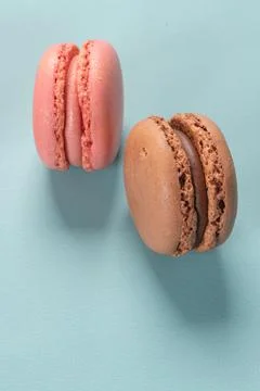Cake macaron or macaroon on turquoise background from above, colorful almond  Stock Photos