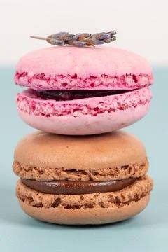 Cake macaron or macaroon on turquoise background from above, colorful almond  Stock Photos