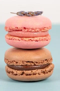 Cake macaron or macaroon on turquoise background from above, colorful almond  Stock Photos