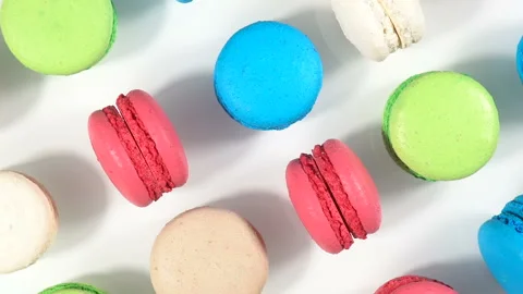 Cake macaron or macaroon on white background from above, rotation colorful Stock Footage 97164680