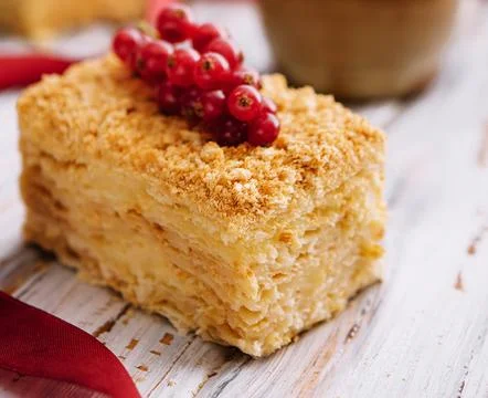 Cake made of thin crispy layers and cream napoleon Stock Photos