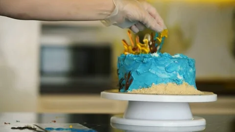Cake in marine style stands on the table closeup. Stock Footage 78623740