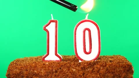 Cake with the number 10 lighted candle. Chroma key. Green Screen. Isolated Stock Footage 139147280
