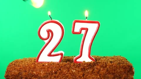 Cake with the number 27 lighted candle. Chroma key. Green Screen. Isolated Stock Footage 139150649