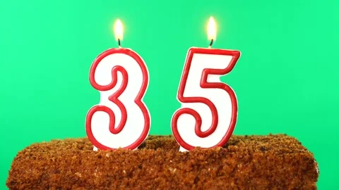Cake with the number 35 lighted candle. Chroma key. Green Screen. Isolated Stock Footage 139152280