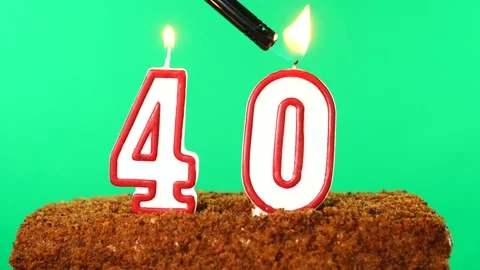 Cake with the number 40 lighted candle. Chroma key. Green Screen. Isolated Stock Footage 139153729