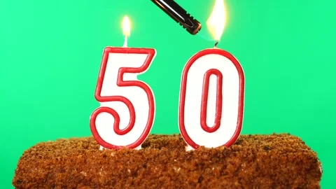 Cake with the number 50 lighted candle. Chroma key. Green Screen. Isolated Stock Footage 139156403
