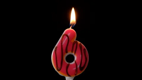 Cake with the number 6 lighted candle. Black background. Isolated. Stock Footage 152706456