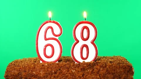 Cake with the number 68 lighted candle. Chroma key. Green Screen. Isolated Stock Footage 139161394