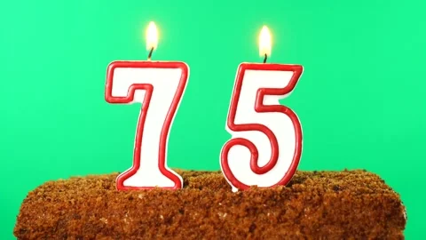 Cake with the number 75 lighted candle. Chroma key. Green Screen. Isolated Stock Footage 139162480