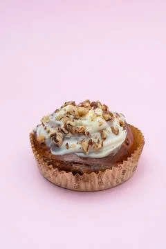 Cake with nuts on a pink background Stock Photos