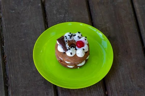 A cake or Honey cake close-up, standing on a wooden table Stock Photos