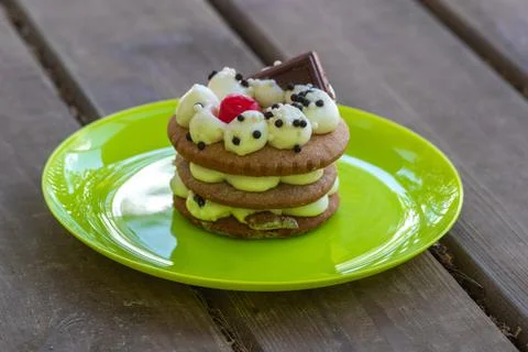 A cake or Honey cake close-up, standing on a wooden table Stock Photos