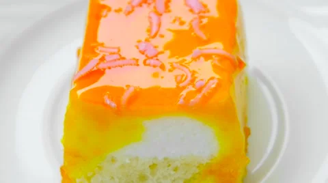 Cake with orange jam on top, closeup Stock Footage 54227746