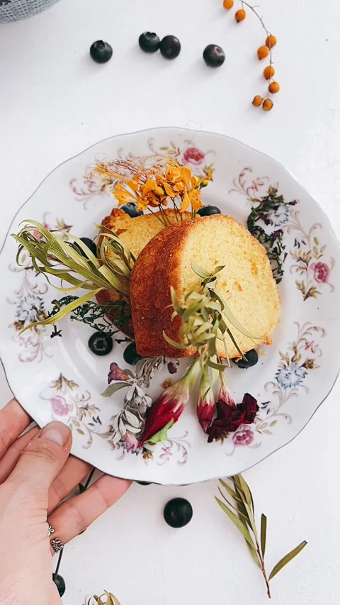 Cake, person placing plate on table, sweet food Stock Footage 227591175