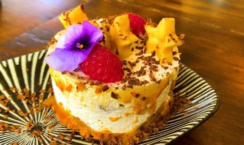 Cake with pineapple on wooden table Foto stock