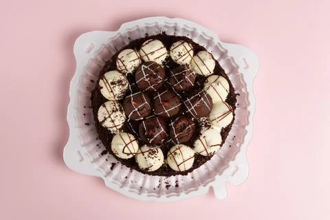 Cake on a pink background. Flat lay, top view Stock Photos