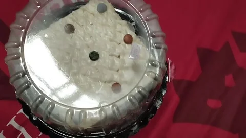 Cake placed on the bed Stock Footage 212796431