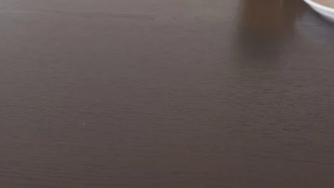 Cake placed on a table, man's hands, 4k Stock Footage 101895531