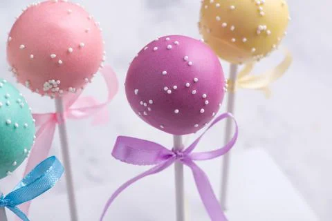 Cake pops on a blurred background Stock Photos