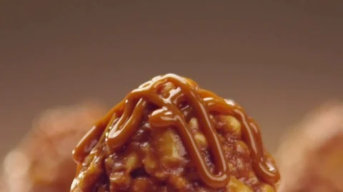 A cake is poured with melted chocolate Stock Footage 75896222
