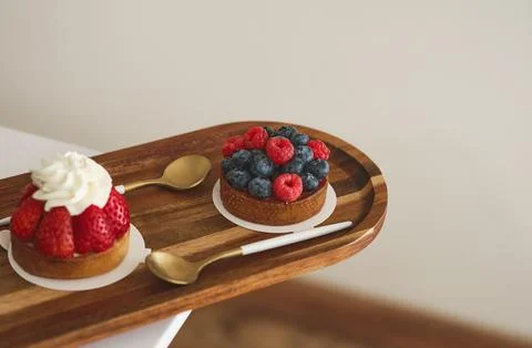 Cake with raspberry and cup of coffee. Stock Photos