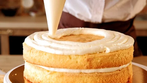 Cake recipe pastry chef piping filling sponge cake Stock Footage 112220181