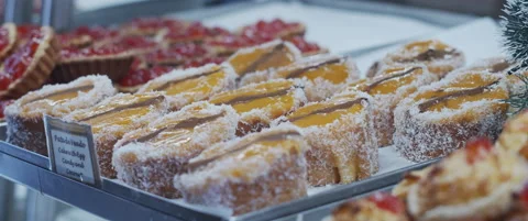 Cake rolls in cafe shop window Stock Footage 152582903